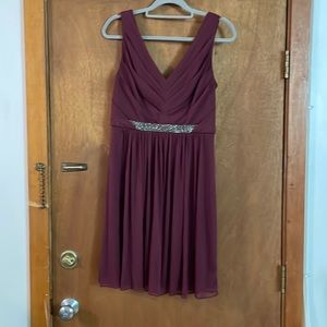 Wine colored David’s Bridal formal dress. Size 10. Used like new. Worn once.